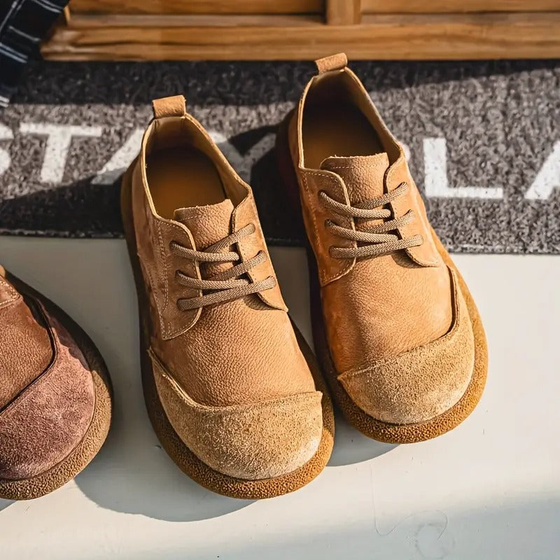 Side view of men's orthopedic khaki leather footwear, emphasizing ergonomic design.