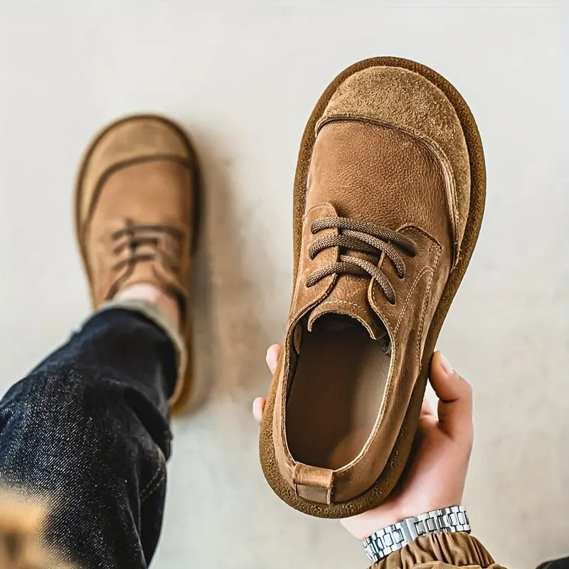 Top-down view of men's brown orthopedic leather casual shoes, showcasing overall design.