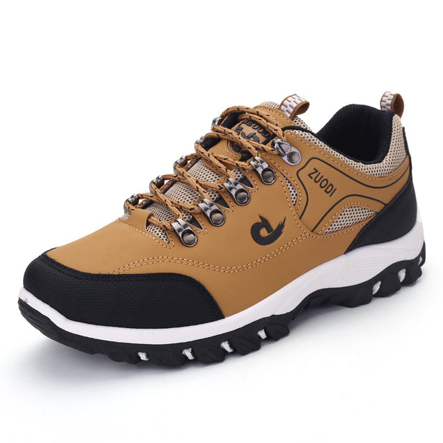 Close-up of men's casual orthopedic walking shoes with breathable mesh upper and cushioned sole.