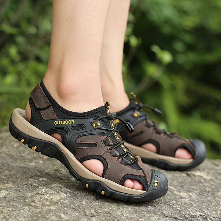 Protective men's closed-toe walking sandals with a non-slip sole, great for outdoor summer activities.