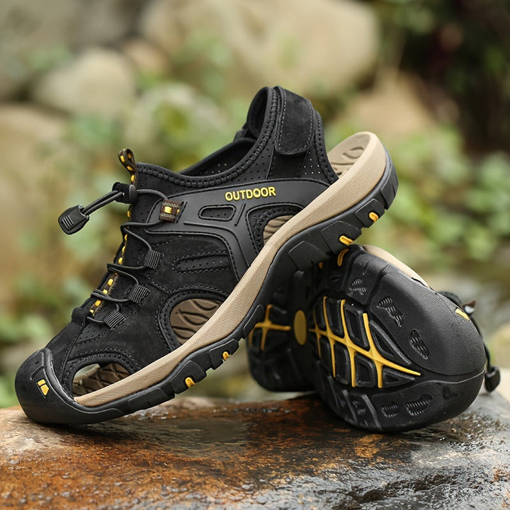 Adventure-ready men's walking sandals, closed-toe design with non-slip sole for all terrains.