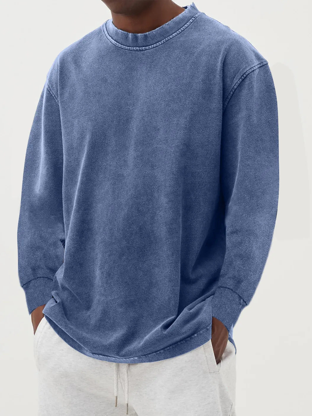 Front view of a men's oversized crewneck sweater, highlighting its relaxed fit & casual appeal.