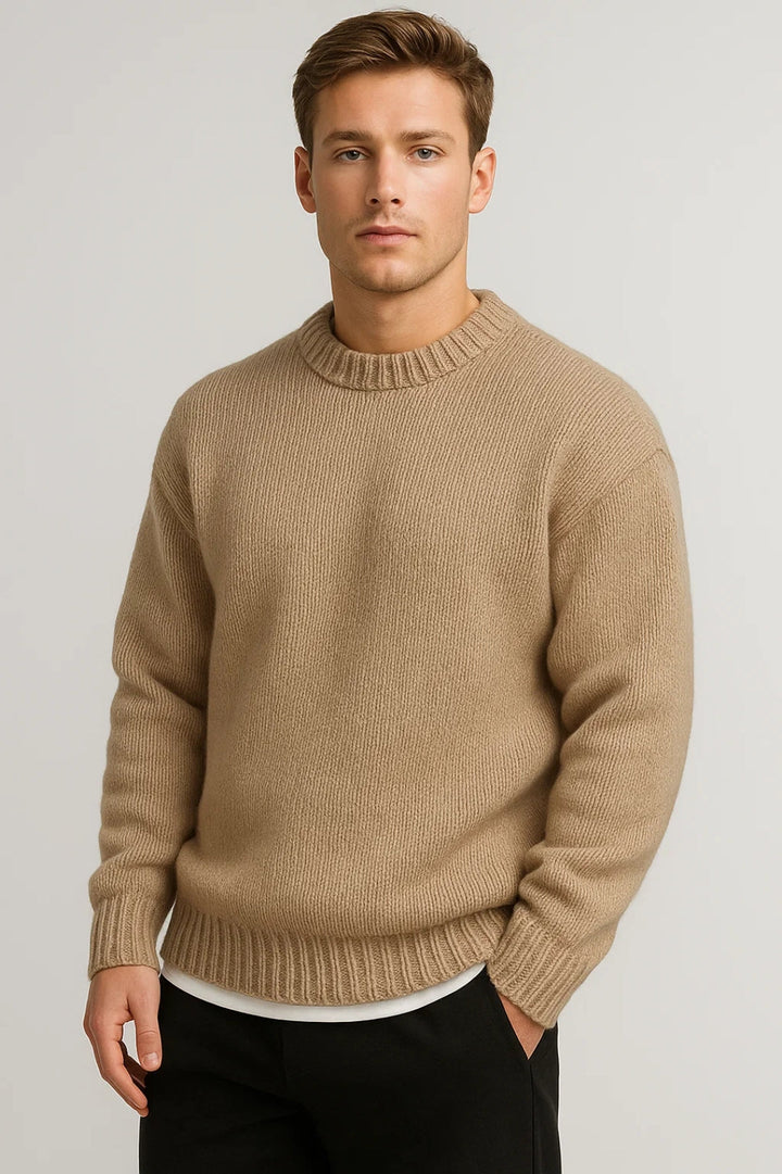 Stylish men's crew neck oversized knit sweater in a relaxed fit, offering ultimate comfort for casual winter wear.