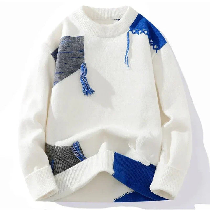Men's oversized patchwork sweater with distressed details, a trendy choice for casual streetwear.