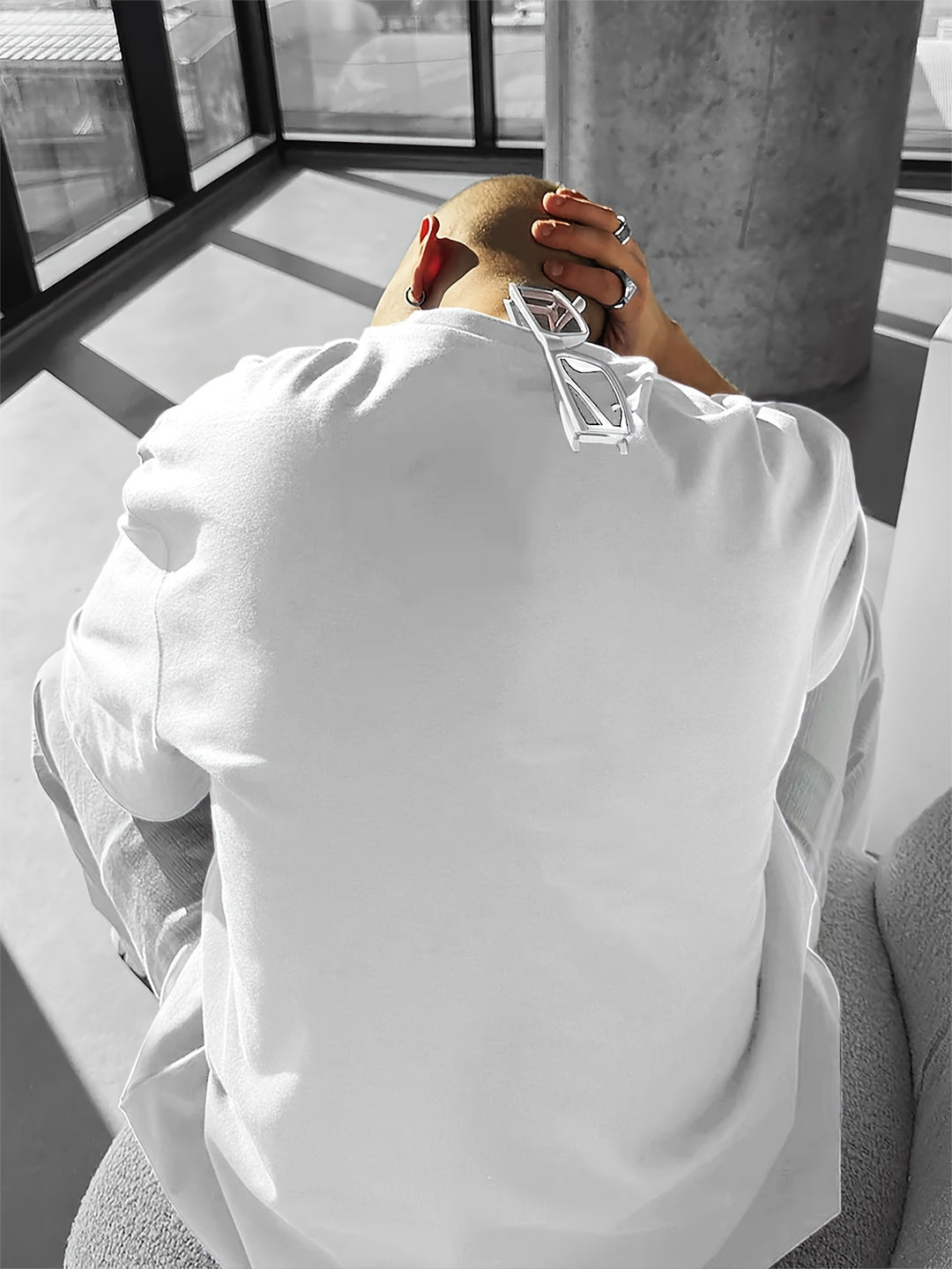 Stylish men's oversized rose print t-shirt, a cool graphic tee for modern casual and urban fashion.