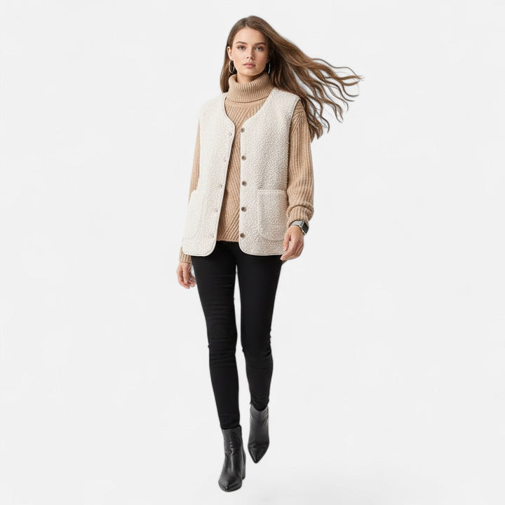 Coffee-colored men's plush cashmere-blend vest, sleeveless and ideal for cold weather layering.