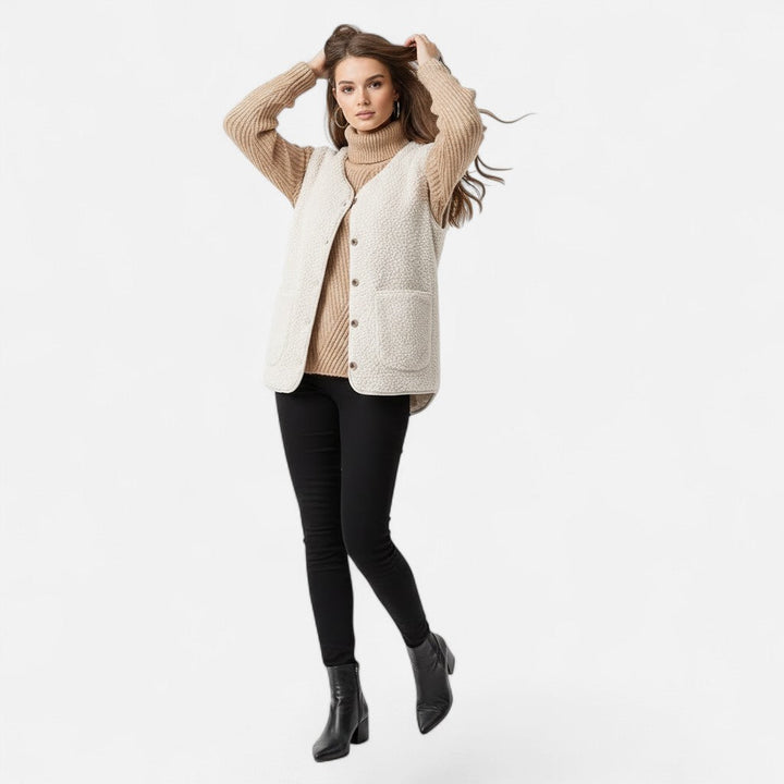 Warm men's cashmere-blend plush vest, a stylish sleeveless layering piece for winter outfits.
