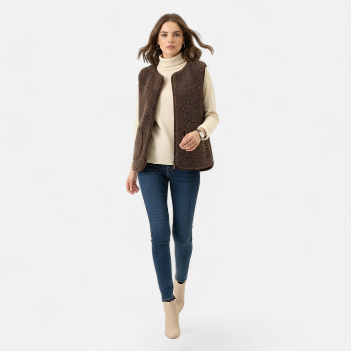 Stylish men's layering vest, plush cashmere-blend fabric, sleeveless design for winter comfort.