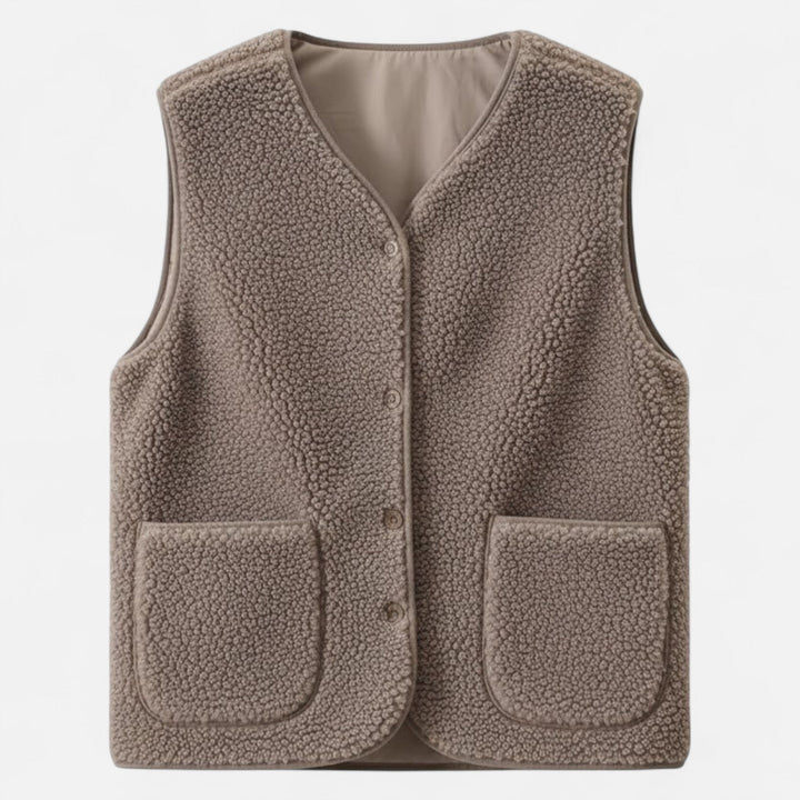 Men's beige plush cashmere-blend vest, designed for warm layering in chilly winter conditions.