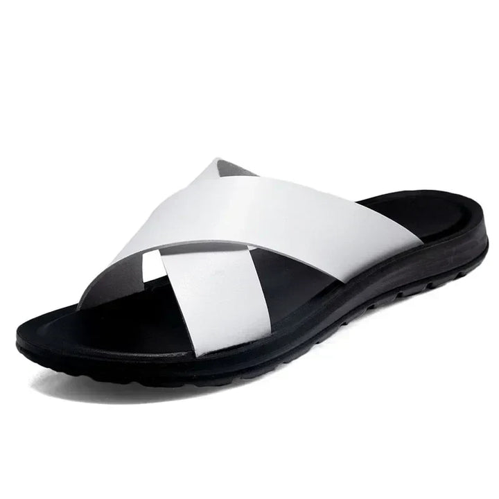 Stylish men's slip-on sandals, perfect for warm weather, beach, or holiday comfort. Easy to wear casual footwear.