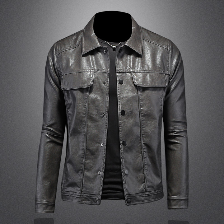 Dark grey men's leather motorcycle jacket, showing texture and fit, trendy outerwear