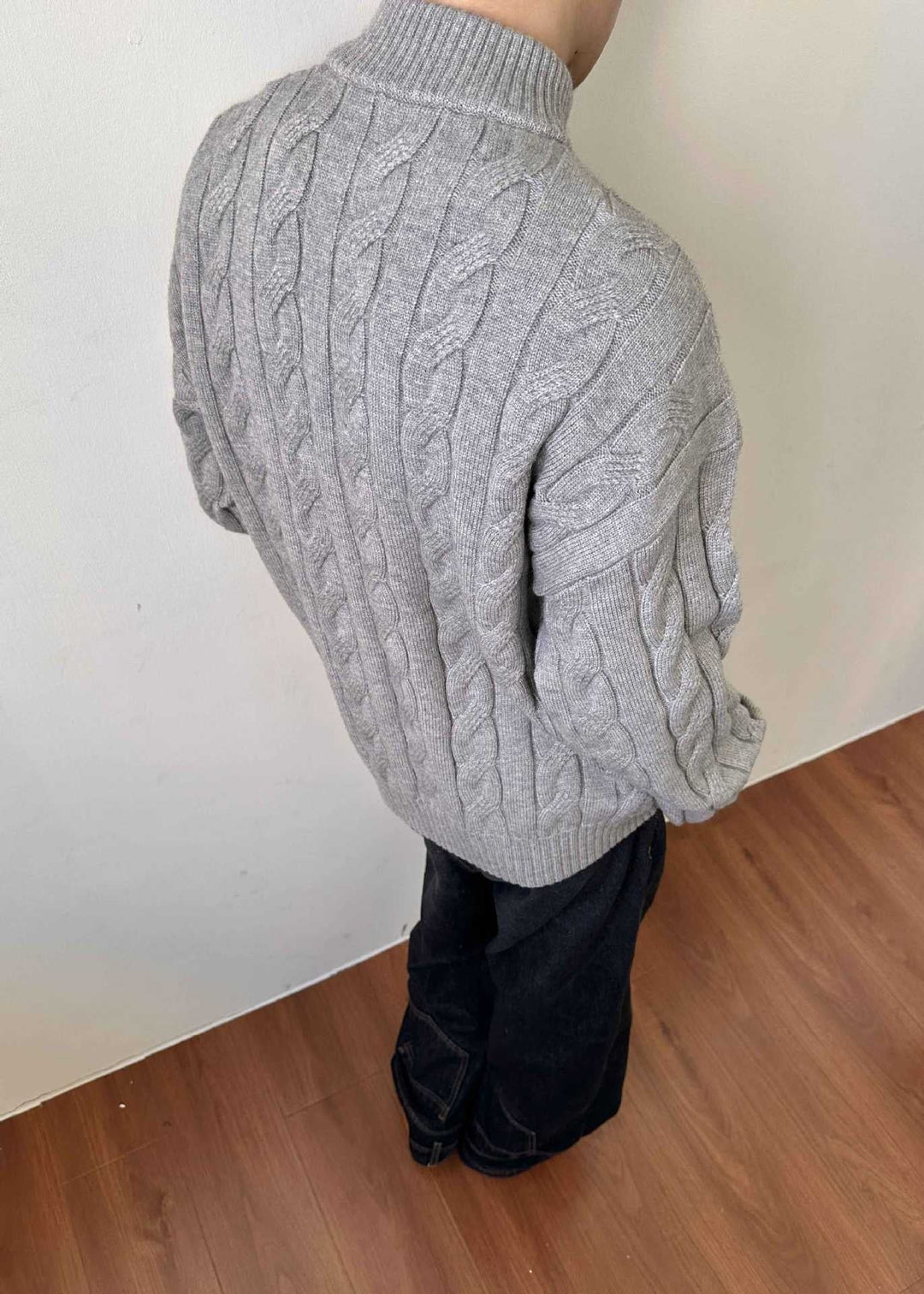 Classic men's mock neck quarter-zip sweater. Cable knit pullover, perfect for casual layering.