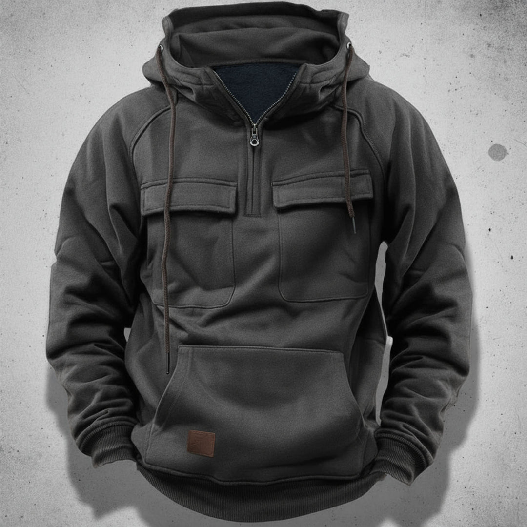 Modern men's quarter-zip hoodie with hood, offering versatile style & practical comfort for casual wear.