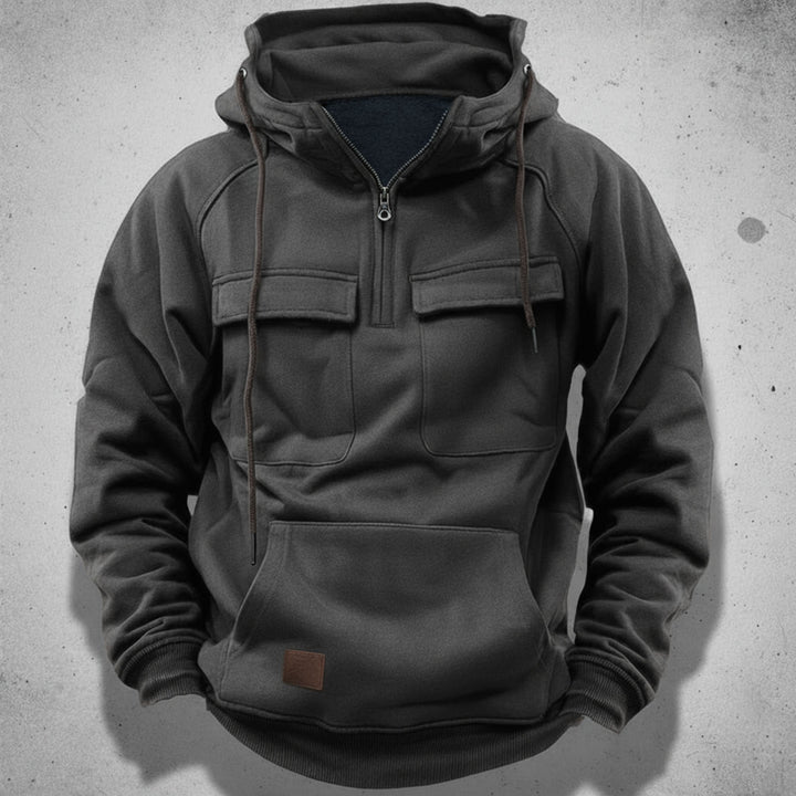 Modern men's quarter-zip hoodie with hood, offering versatile style & practical comfort for casual wear.