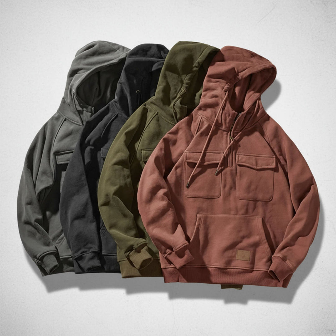 Relaxed fit men's quarter-zip hooded sweatshirt, essential for comfortable men's fashion & casual layering.