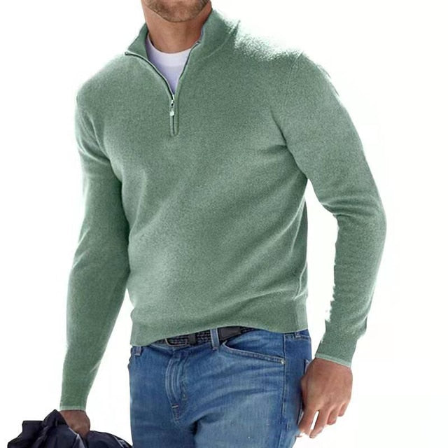 Detail of the stand collar and quarter zip on a men's pullover sweater, emphasizing comfort and casual style.
