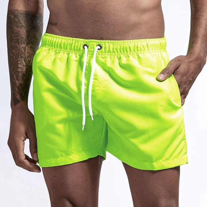 Group of Men's Quick-Dry Swim Shorts, displaying wide range of colors for diverse tastes
