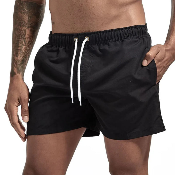 Men's Quick-Dry Swim Shorts in vibrant blue, perfect for summer fashion and men's swimwear