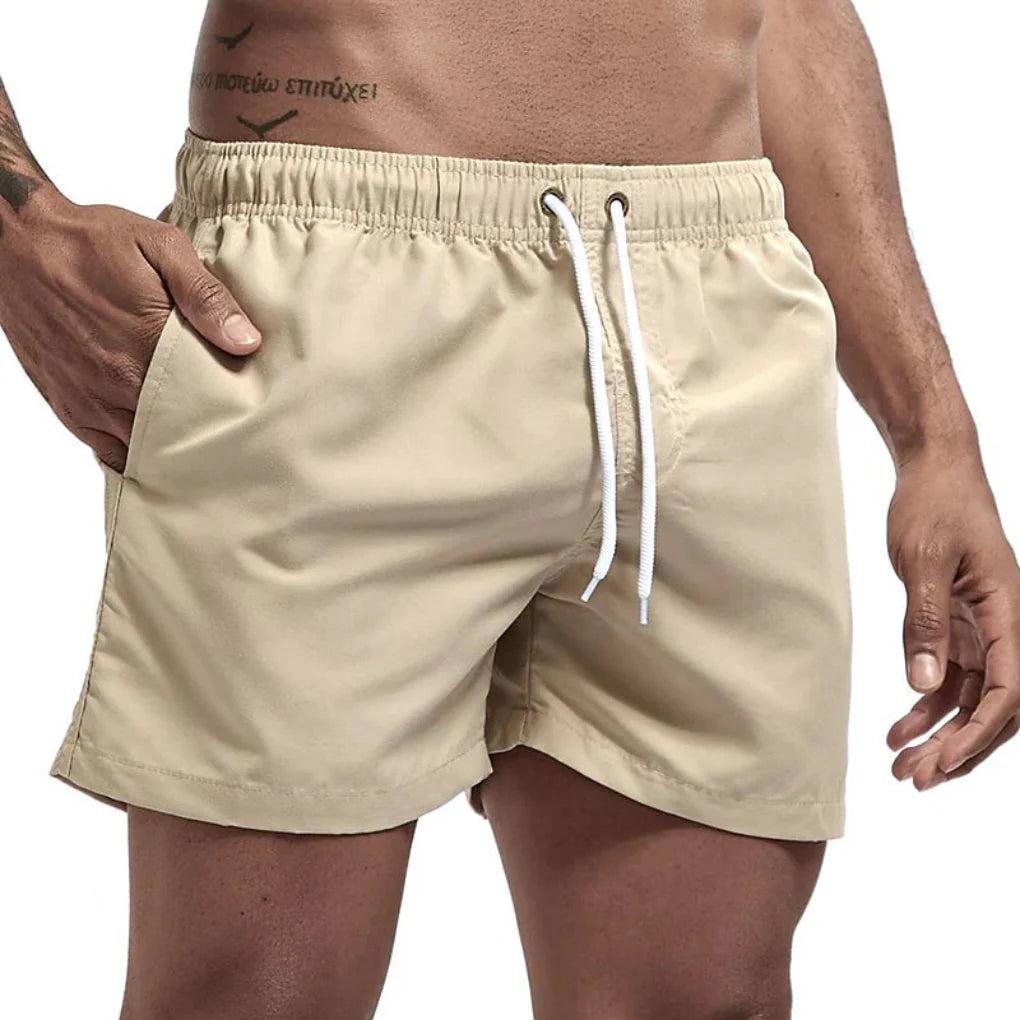 Detail of waistband and drawstring on Men's Quick-Dry Performance Swim Shorts, secure fit