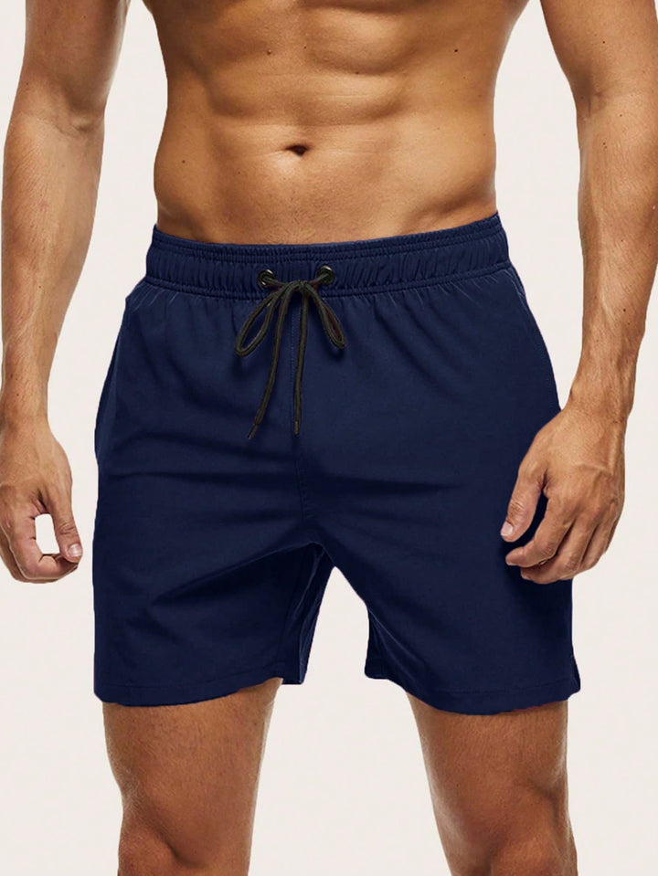 Versatile men's quick-dry swim shorts, lightweight stretch for summer fashion and beach activities.
