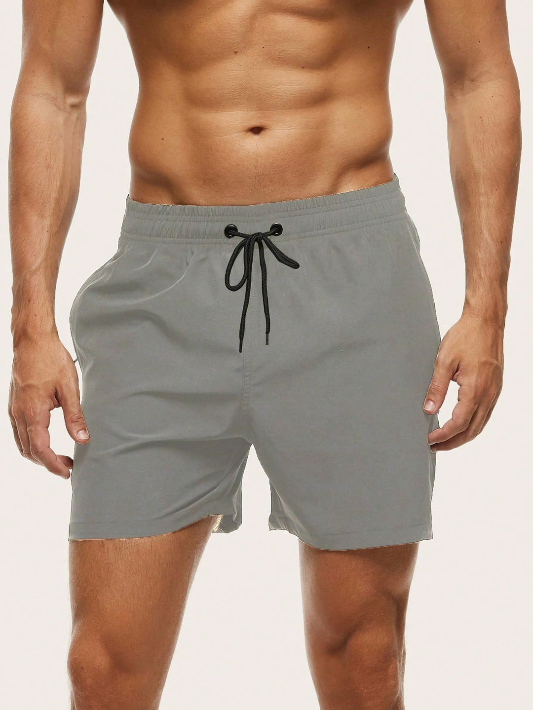 Performance men's swim shorts: quick-dry, lightweight stretch fabric for beach & pool.