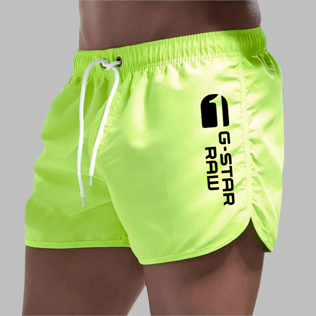 Quick-dry men's beach shorts, comfortable design for swimming and summer activities.