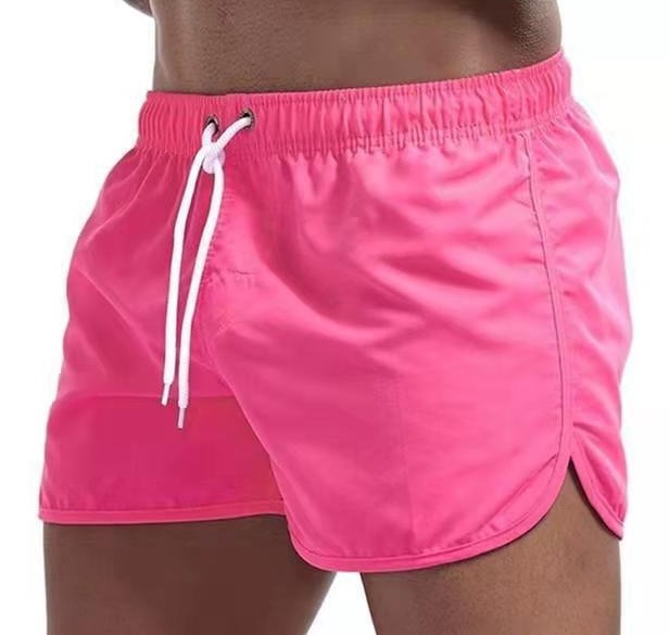 Comfortable men's athletic quick-dry swim trunks with elastic waist and drawstring. Great for activewear.