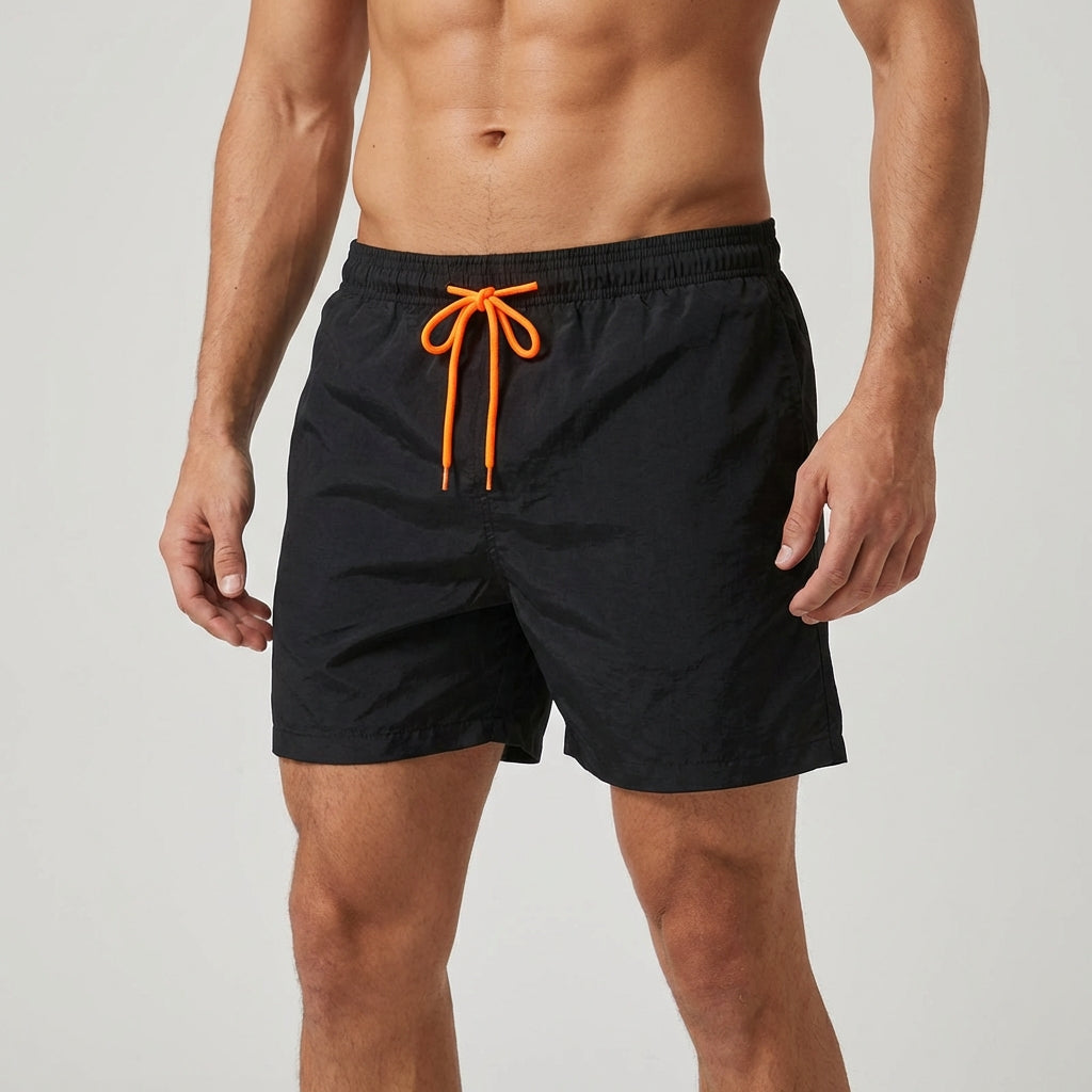 Sporty men's swimwear: Quick-dry shorts, elastic waist, perfect for summer vacation.