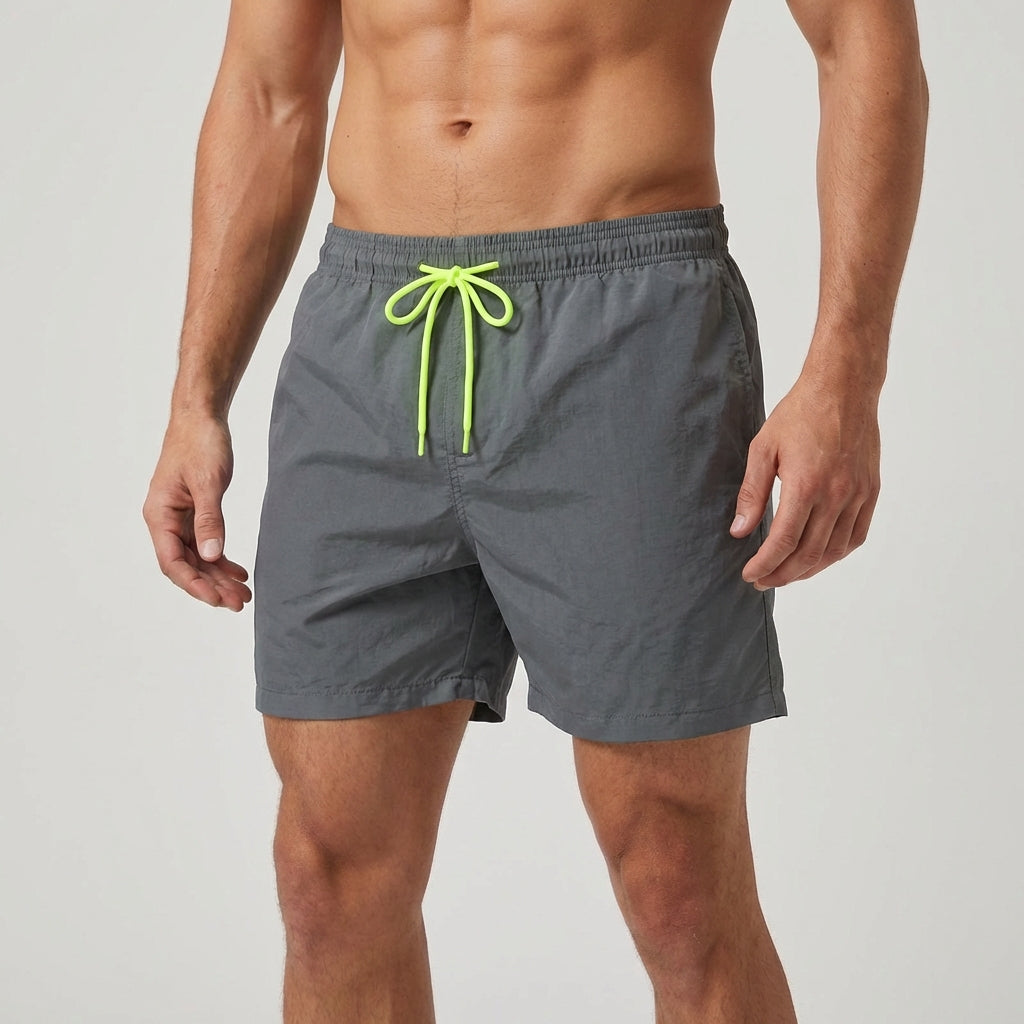Men's quick-dry activewear swim shorts with adjustable waist, great for summer.