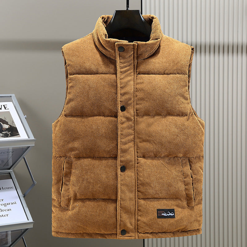 Men's quilted puffer vest, sleeveless for layering. Warm winter outerwear for a stylish casual look.