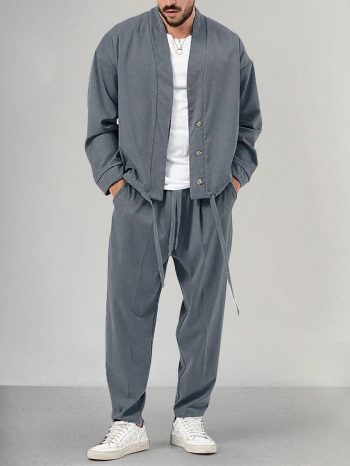 Stylish men's knit 2-piece track suit with relaxed fit, ideal for home comfort, travel, or casual wear.