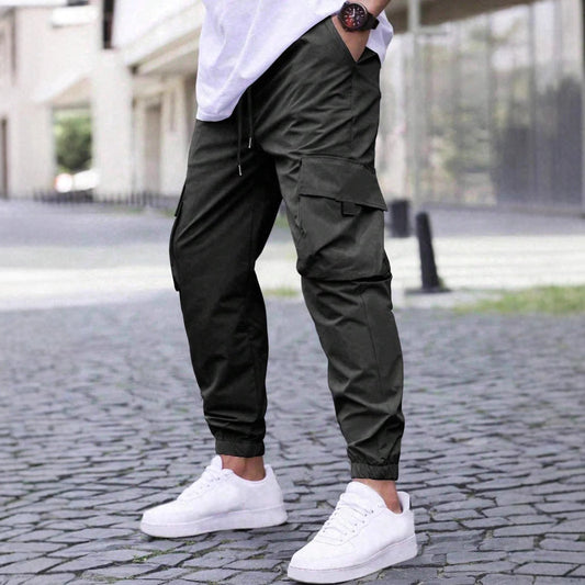 Men's relaxed fit black cargo jogger pants with utility pockets, side view