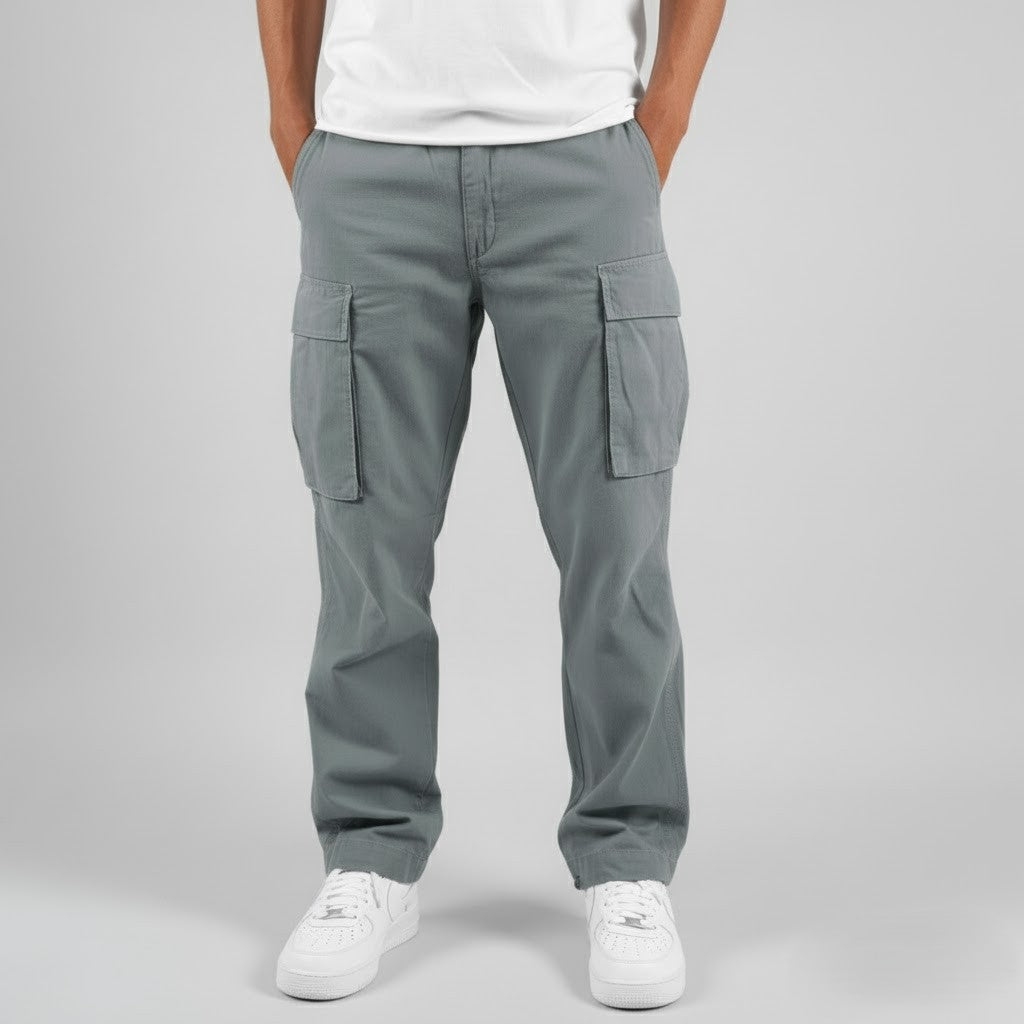 Relaxed fit men's cargo pants in a versatile navy color, great for casual streetwear looks.