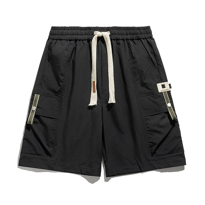 Practical men's utility cargo shorts featuring multiple pockets and a comfortable drawstring waist for spring/summer wear.