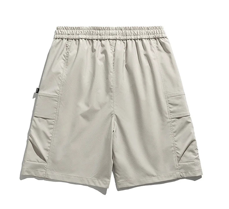 Versatile men's relaxed cargo shorts with practical side pockets & a secure drawstring waist for all-day comfort.