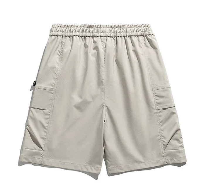 Versatile men's relaxed cargo shorts with practical side pockets & a secure drawstring waist for all-day comfort.