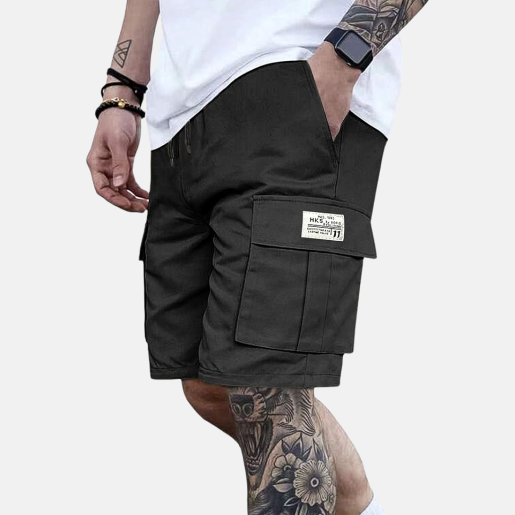 Comfortable men's loose fit cargo shorts for summer vacation & outdoor adventure. Elastic waist, knee-length casual wear.