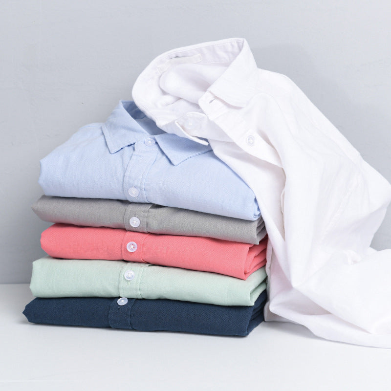 Classic men's button-down long sleeve shirt, relaxed fit. Offers comfort and stylish versatility.