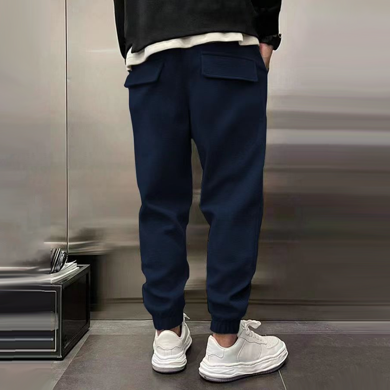 Collection of men's relaxed fit casual trousers in various colors, comfortable and fashionable apparel