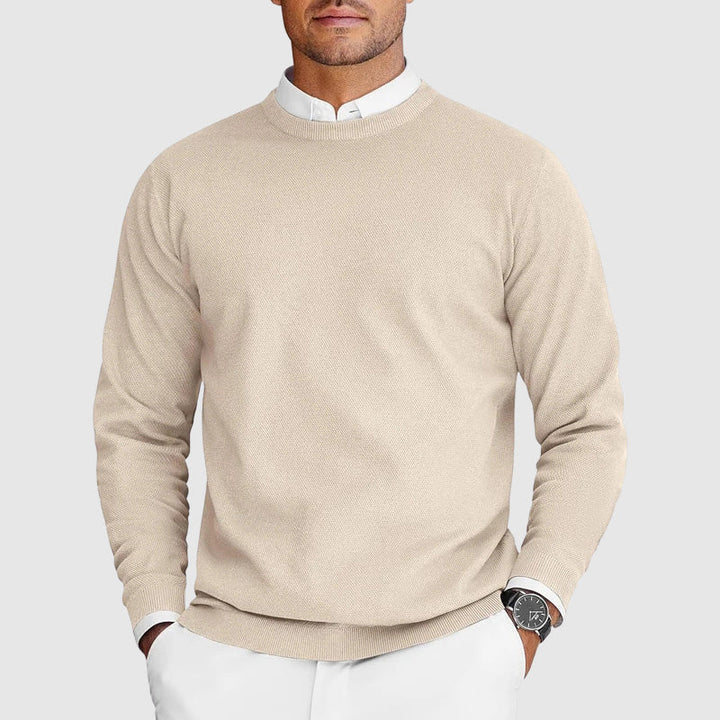 Soft men's relaxed crew-neck sweater, comfortable for everyday wear. Classic pullover style for casual occasions.