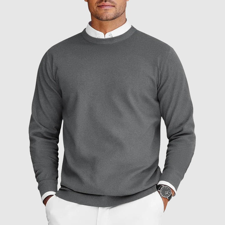 Men's relaxed fit crew-neck jumper, a cozy and comfortable long-sleeve pullover for everyday fall and winter wear.