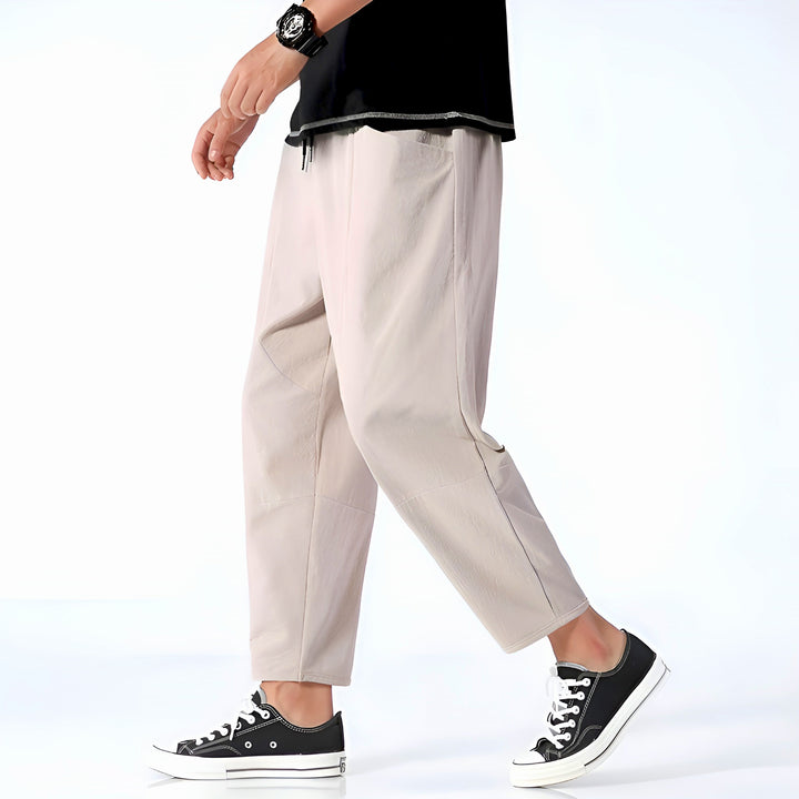 Premium men's relaxed fit cropped chinos, versatile straight leg design for modern casual comfort.