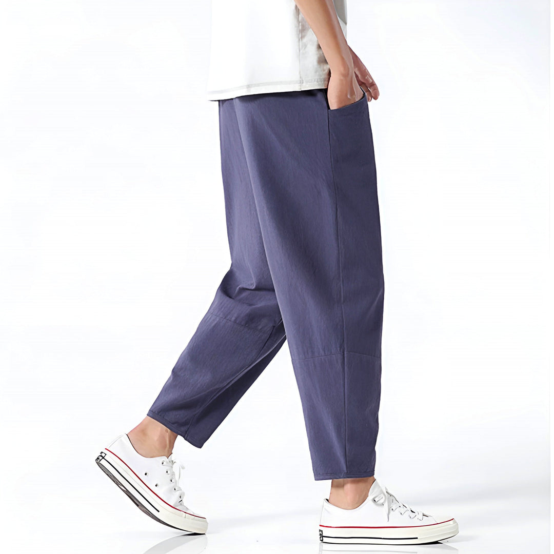 Modern men's drawstring cropped chinos, relaxed fit, ideal for casual summer style.