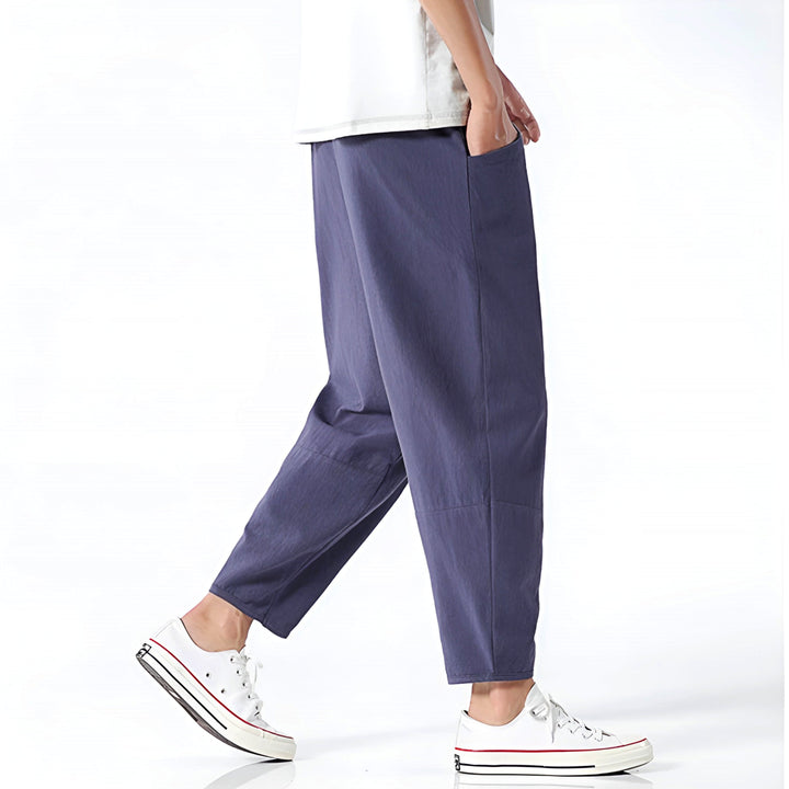 Modern men's drawstring cropped chinos, relaxed fit, ideal for casual summer style.