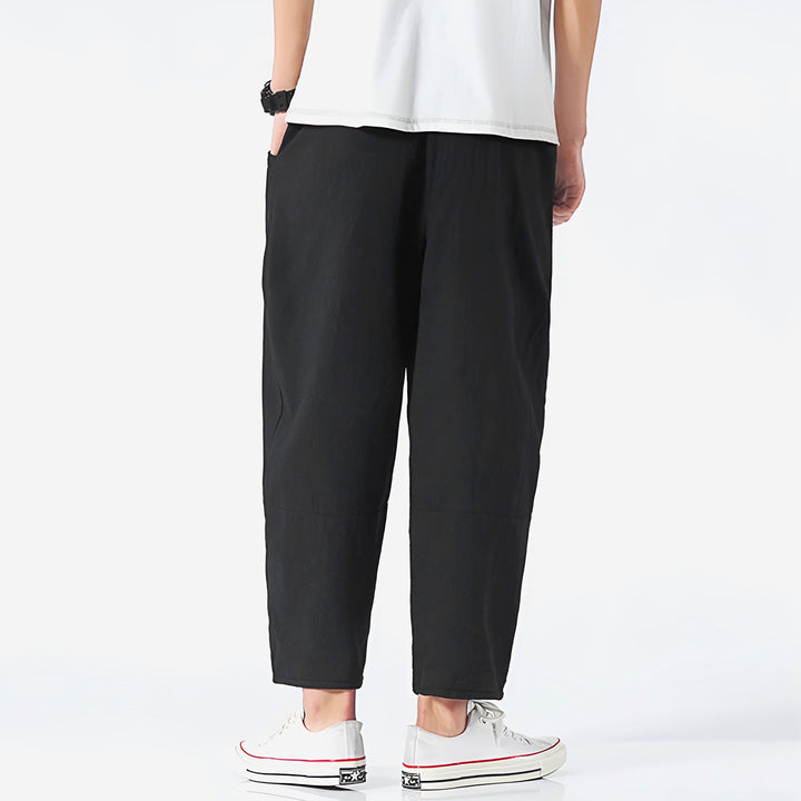 Side view: Men's comfortable relaxed fit cropped pants, modern style for versatile bottom wear.
