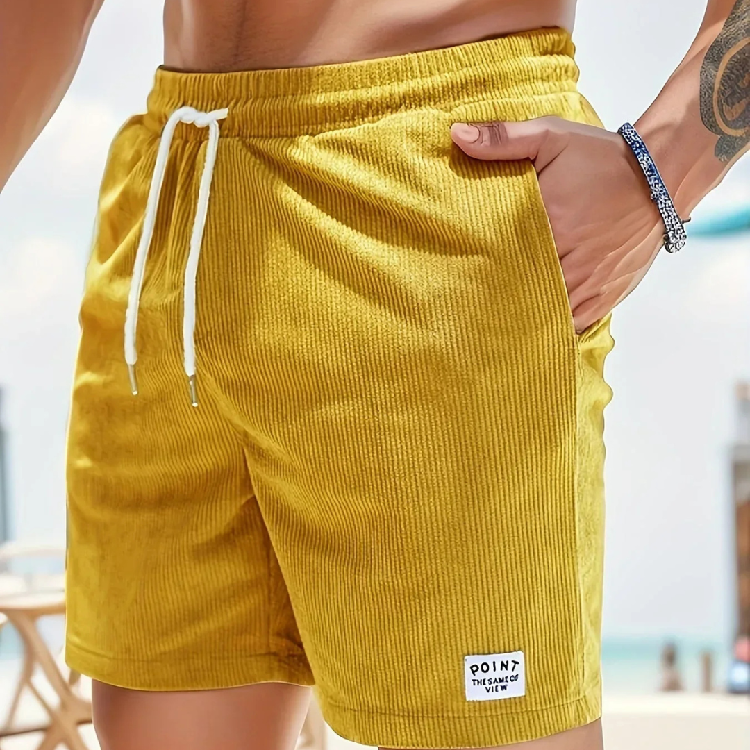 Summer-ready men's drawstring shorts, relaxed fit & stylish patch detail for a modern look.