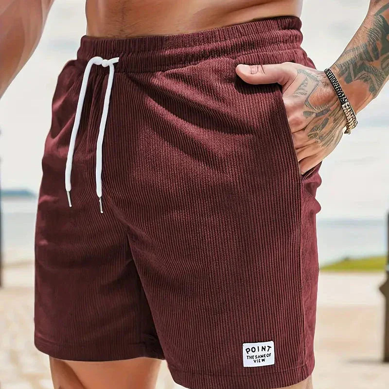 Comfortable men's relaxed fit shorts, drawstring closure, versatile everyday style.