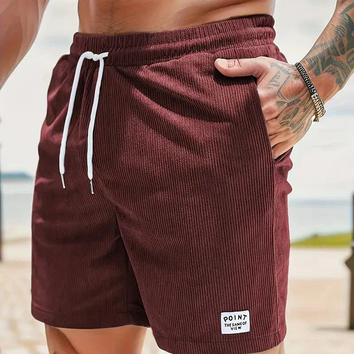 Comfortable men's relaxed fit shorts, drawstring closure, versatile everyday style.