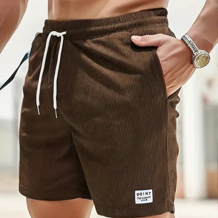 Stylish men's relaxed fit shorts, drawstring for comfort & easy casual wear.