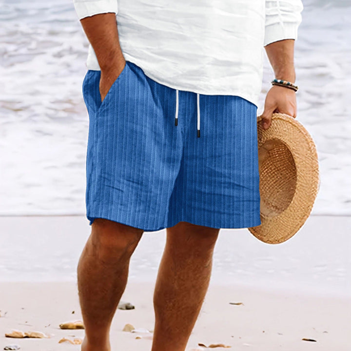 Men's relaxed fit drawstring shorts with pockets, combining comfort & casual summer style.